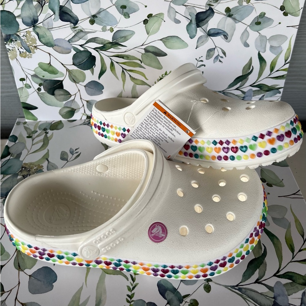 NWT crocs with colorful glitter heart border